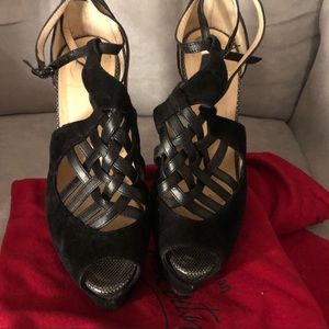 Black CL platform heels. Worn only a few times.